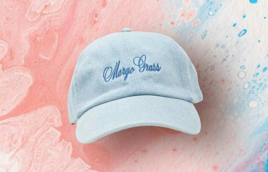 Blue hat between pink